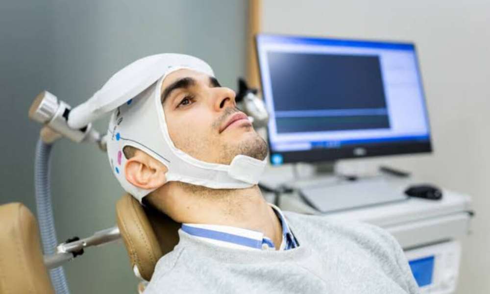 Healthcare professional providing TMS Therapy treatment for depression symptoms