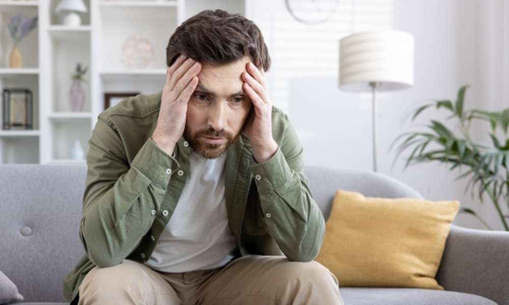 Person experiencing anxiety symptoms and emotional stress in daily life