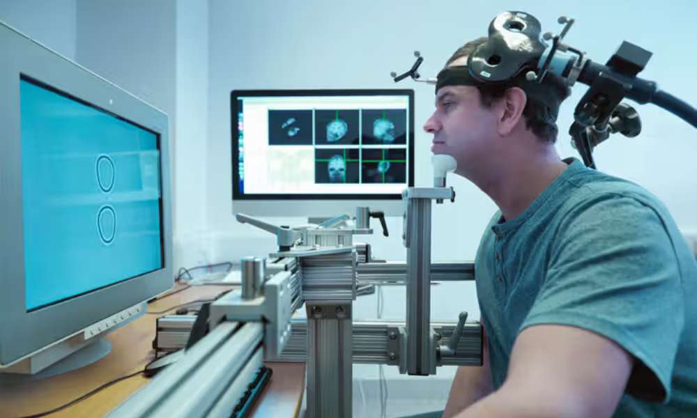 Person receiving TMS Therapy for Anxiety Symptoms under professional supervision