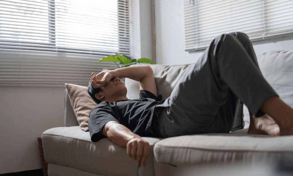 Person experiencing emotional distress and sleep problems